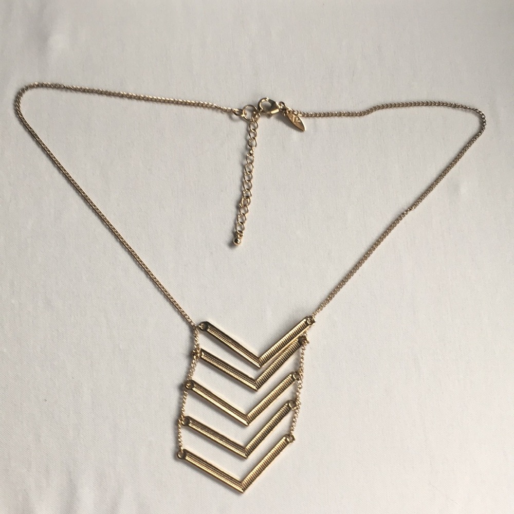 Vintage NY gold tone hanging arrow point n…